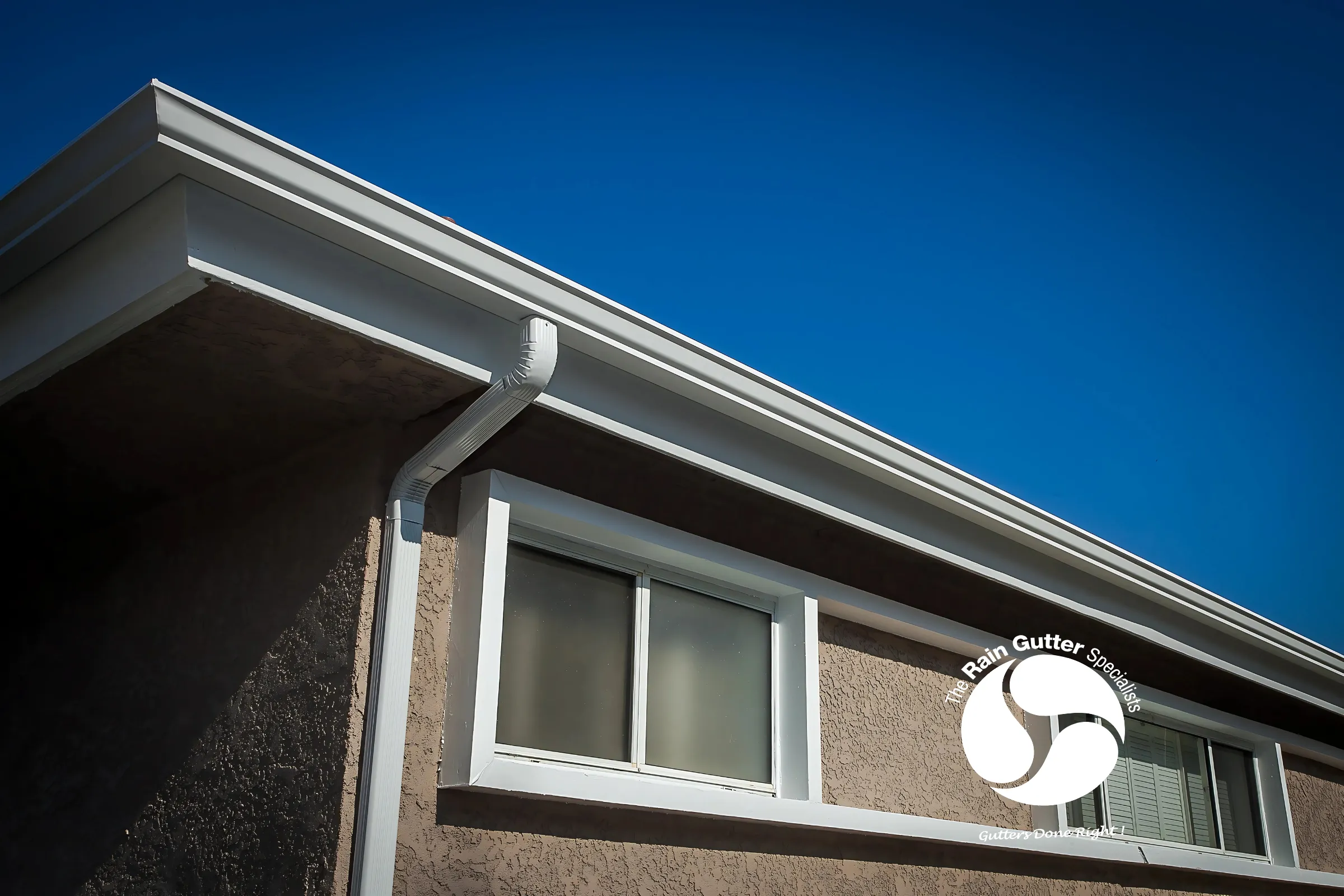 Traditional OG gutters on a residential home by The Rain Gutter Specialists