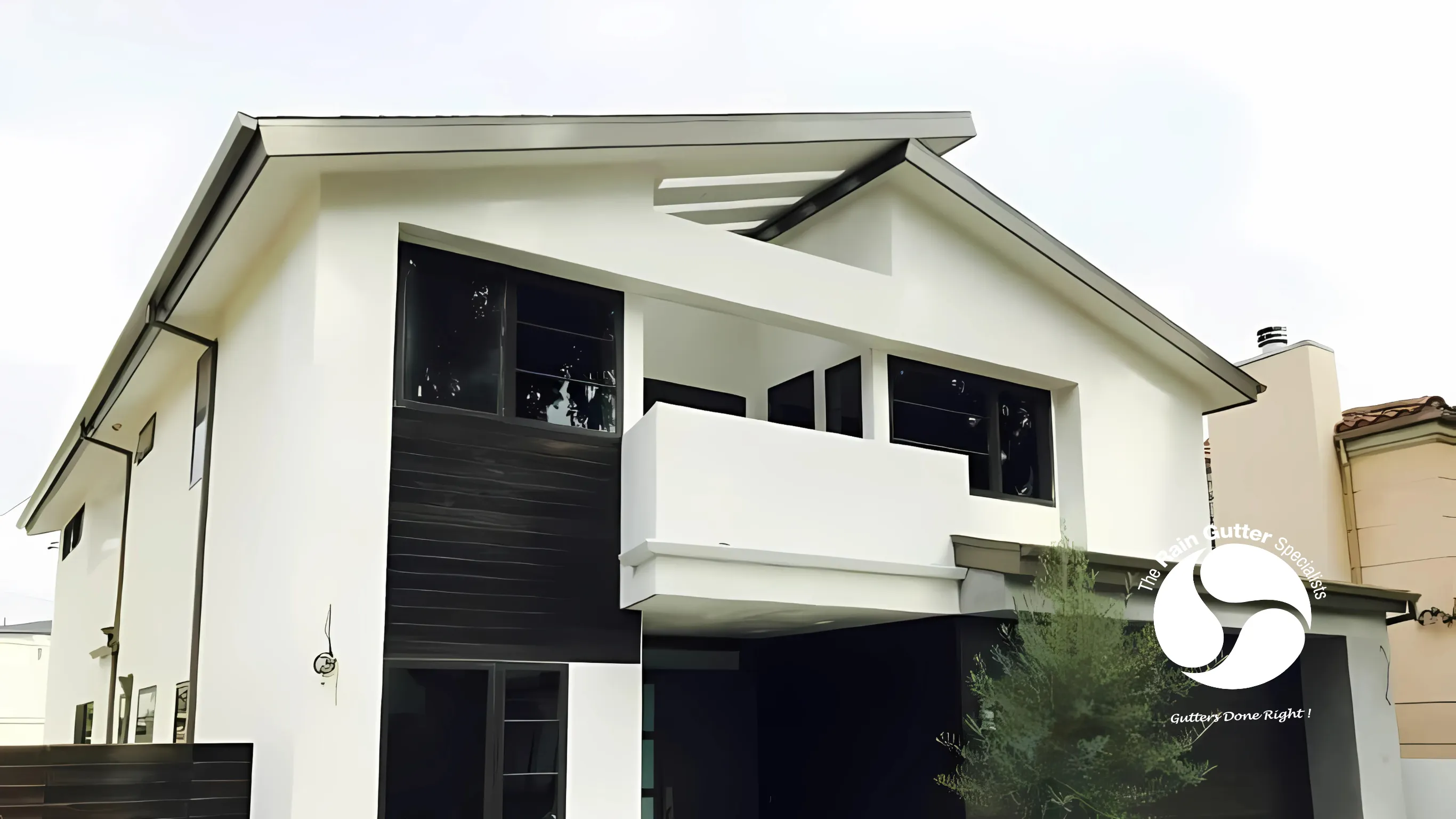 Minimalist house design with flat face gutter style.