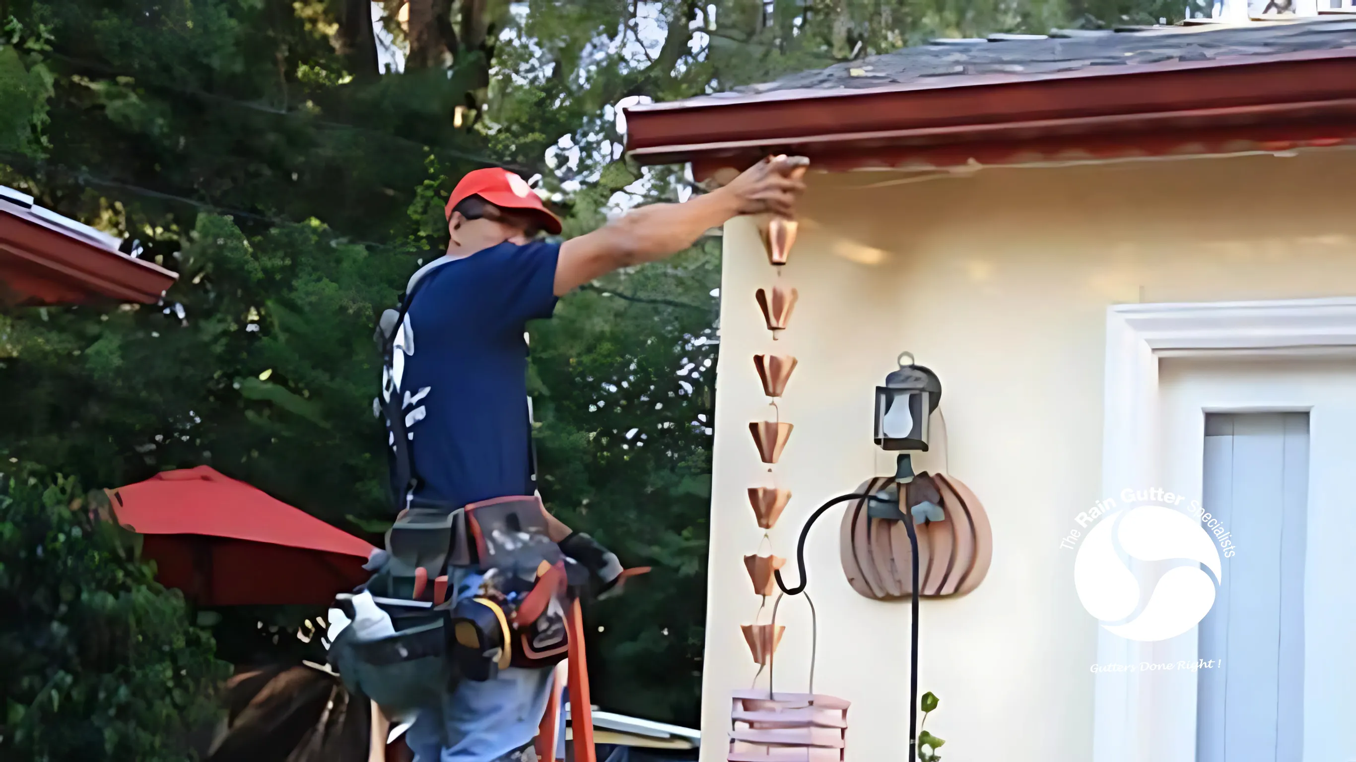 Spring gutter cleaning with leaves and debris being removed