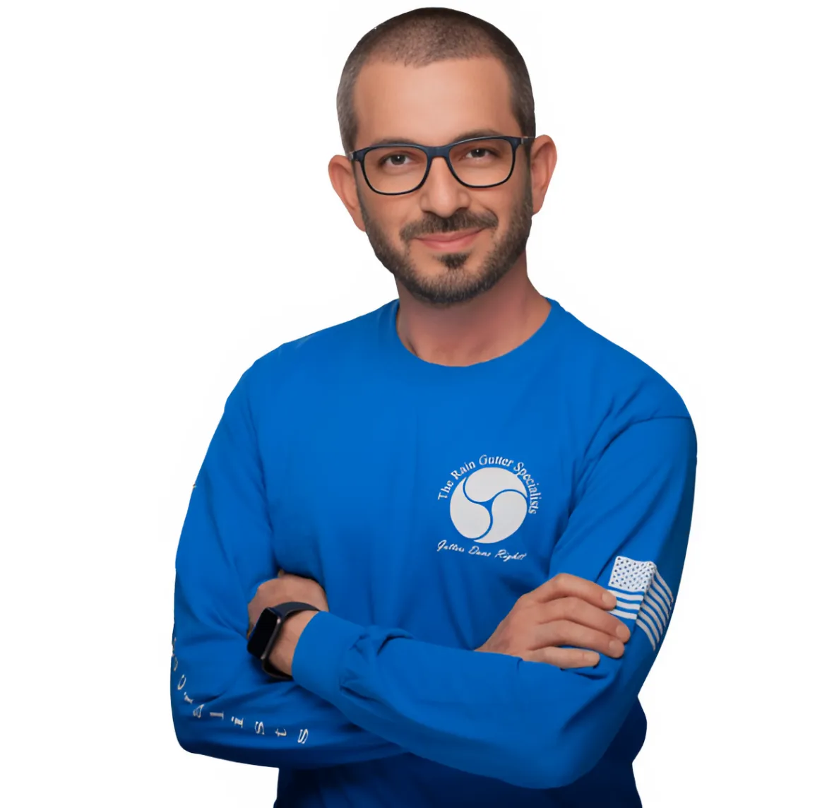 Guy Ziv, owner of The Rain Gutter Specialists, wearing blue team uniform with arms crossed